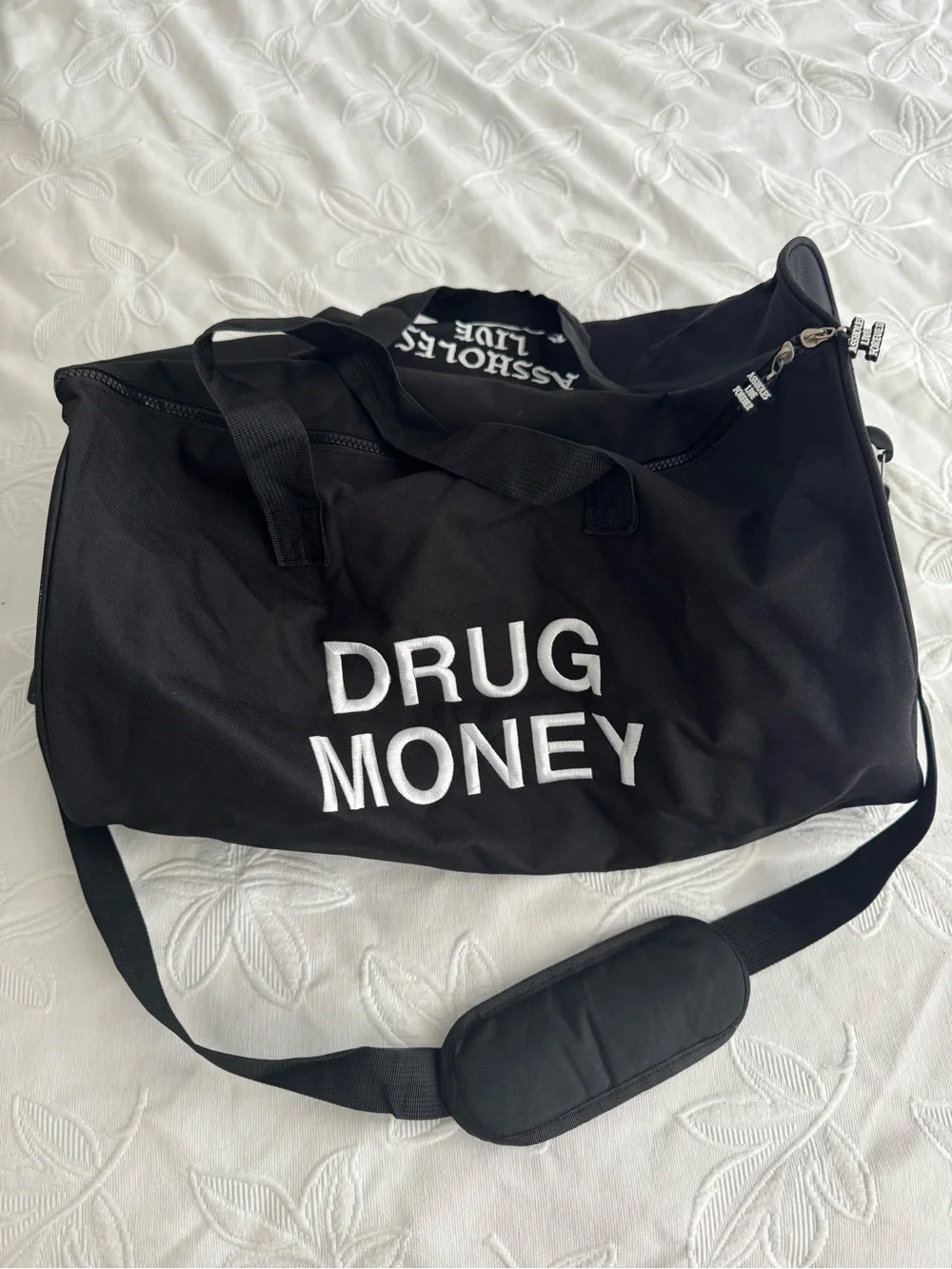 Black Duffel Bag with Bold White 'DRUG MONEY' Branding